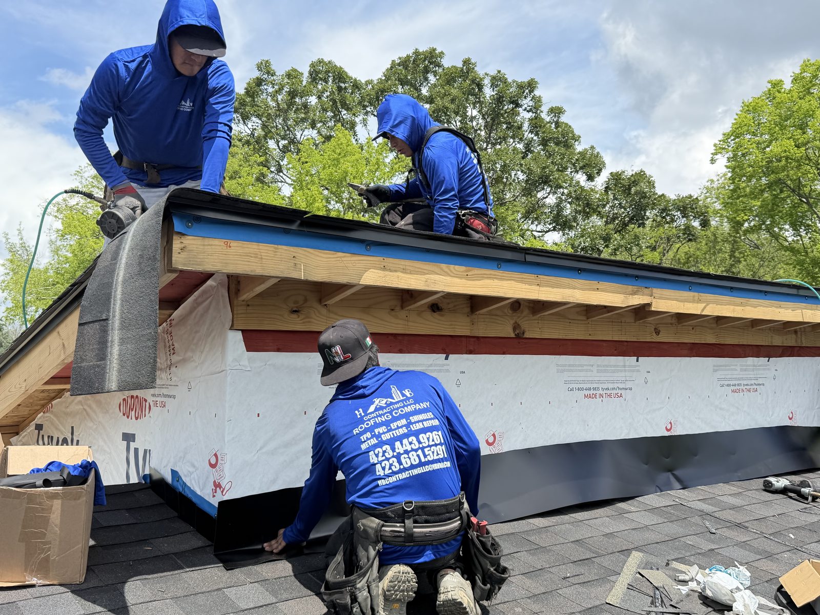 HB Contracting crew installing a shingle roof ridge in Chattanooga, TN