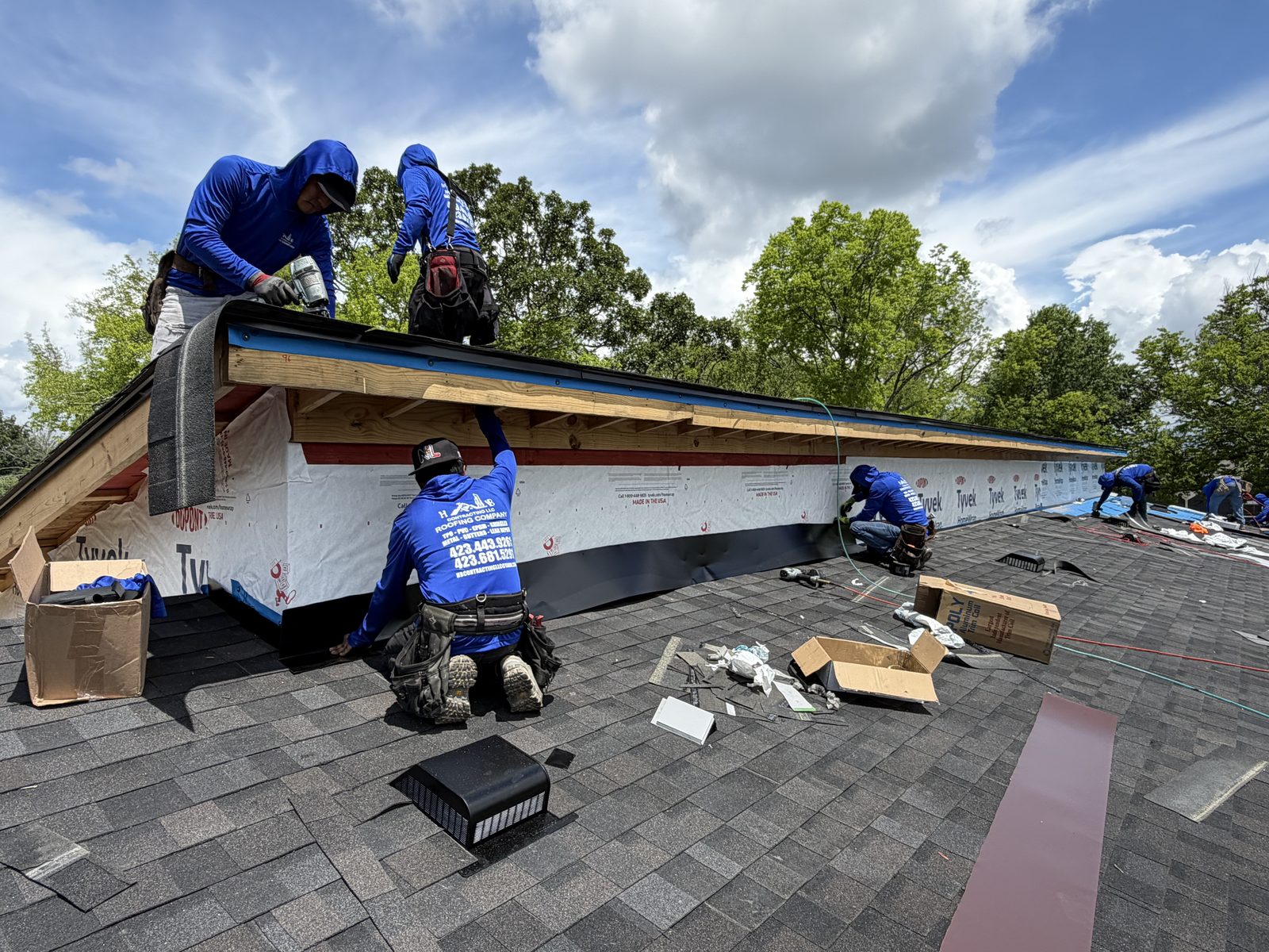 HB Contracting in-house crew working on a residential roof