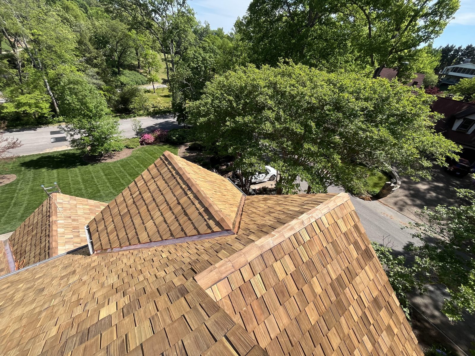 Finished multi-peak asphalt shingle roof on a Chattanooga-area home